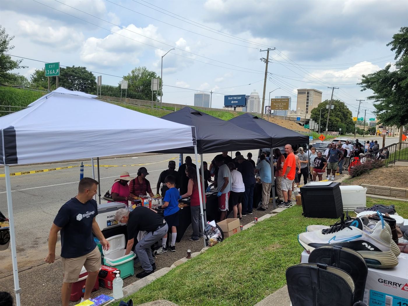 Tents set up outdoors for a His Blessings Box community day in Louisville