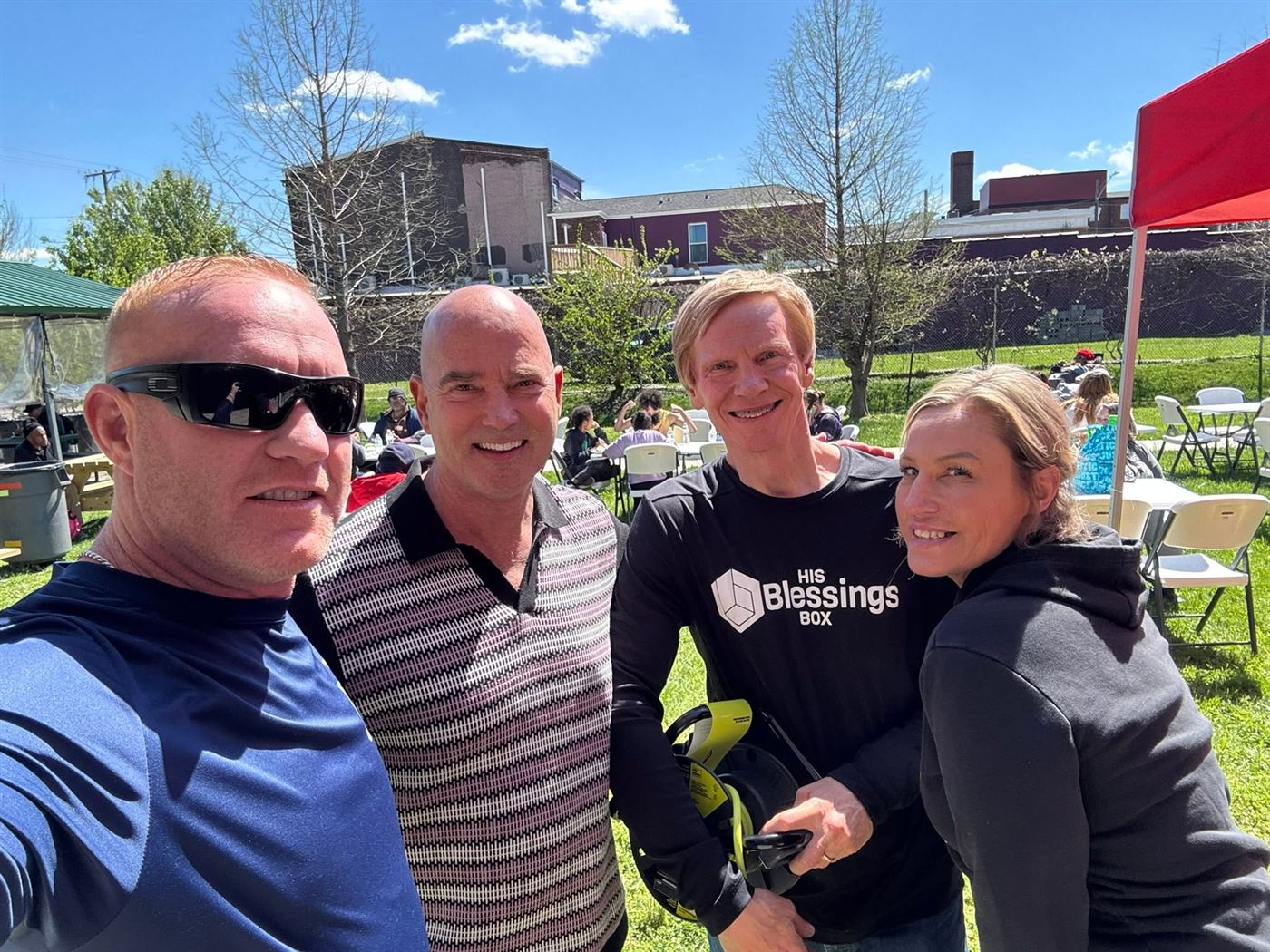 Volunteers gathered outdoors at a community event